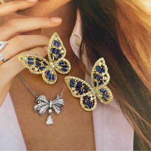 New In Unbranded Box butterfly earrings